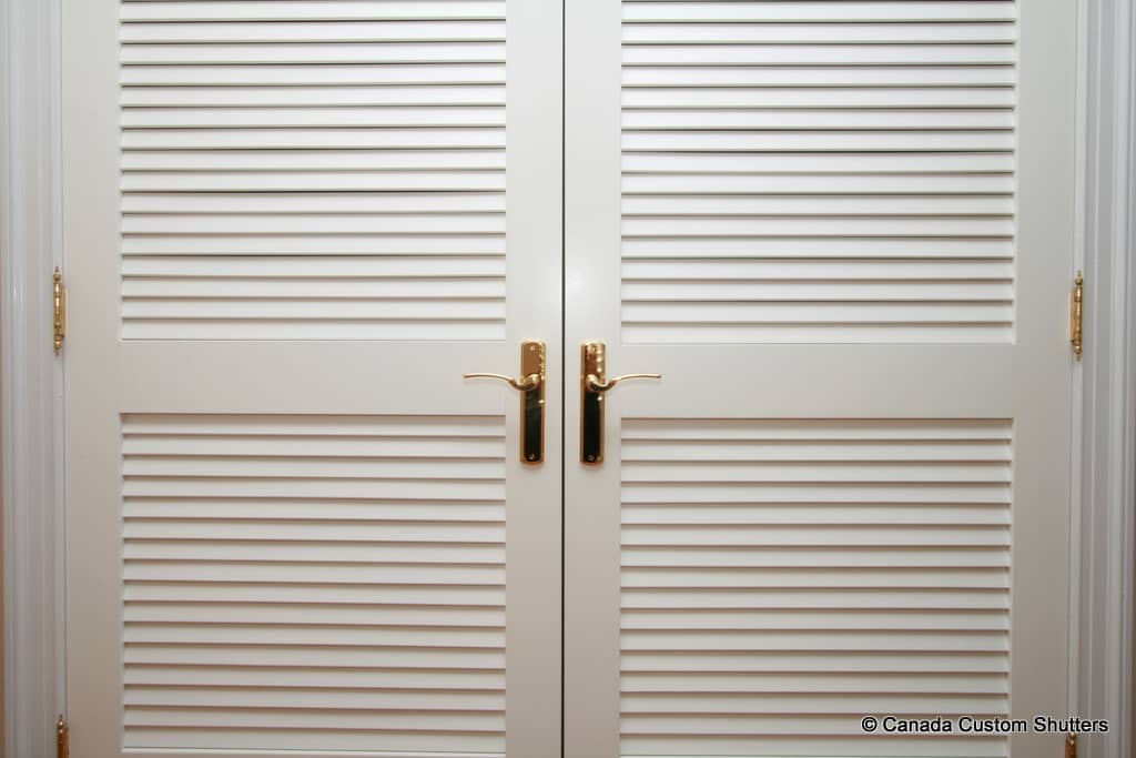 Louvered closet doors with premium hardware